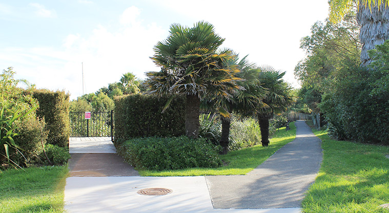 98 Pinecrest Drive - Two paths joining with a gate and bushes in the background. Photo credit: M Loubser.