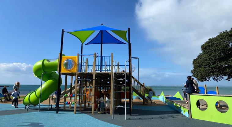 Browns Bay Beach Reserve - Brightly coloured playground with slide. Photo credit: T Hodder.