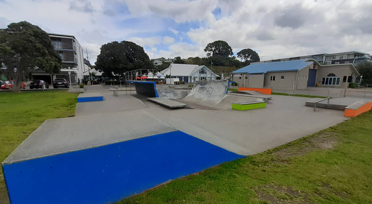 Browns Bay Beach Reserve - Skate half-pipe with buildings in the background. Photo credit: T Hodder.
