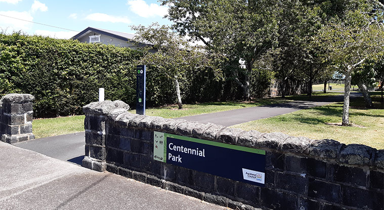 Centennial Park - Sign on the block wall at the Marsden Avenue entrance.