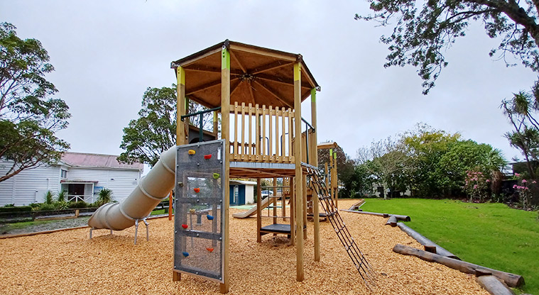Collins Park - Covered play modules with slides, climbing and swinging equipment and platforms.