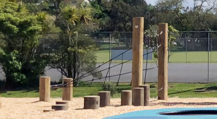 Edith Hopper Park - Climbing net with a variety of wooden stumps for jumping across and balancing.