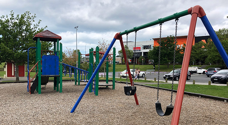 Hooton Reserve - Playground with swings and a play module with a range of play equipment.