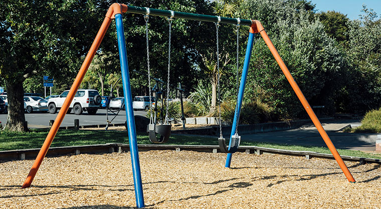 Hooton Reserve - Swing set with a bucket swing and a belt swing. Photo credit: Jay Farnworth.