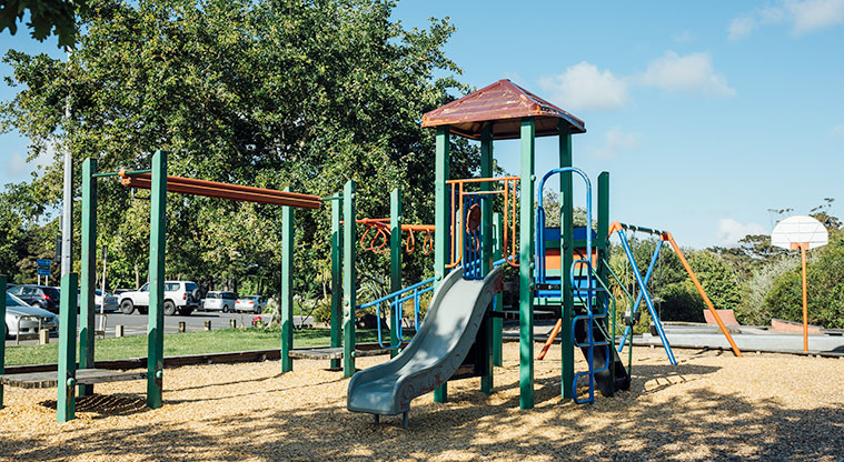 Hooton Reserve - Playground with a slide, swings bars and climbing equipment. Photo credit: Jay Farnworth.