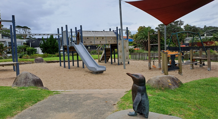 Poa Taniwha / Huntly Road Reserve - Small playground with a slide, climbing wall, monkey bars, swings and more. Photo credit: M Woodside.