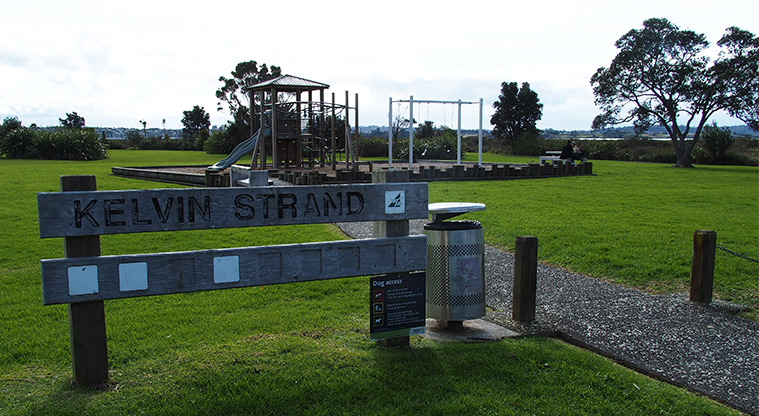 Kelvin Strand - Sign at the entrance of the park and the playground in the background. Photo credit: Tracey Hodder.
