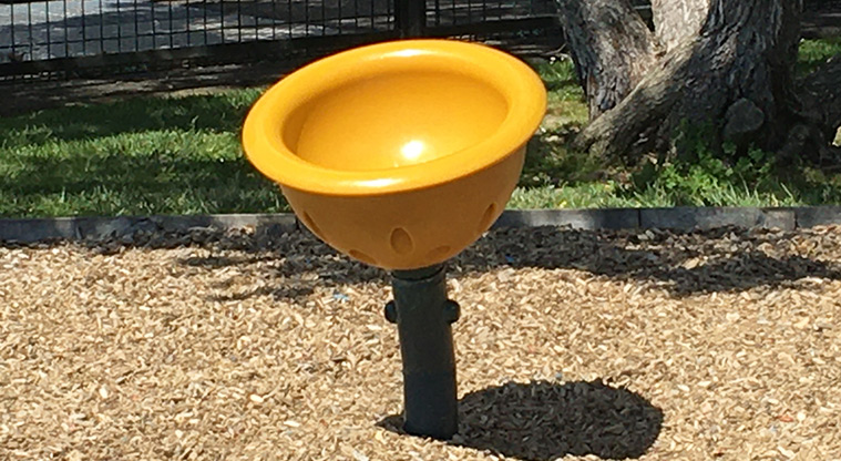 Maraetai Park - Yellow spinning egg cup. Photo credit: S Hulse.