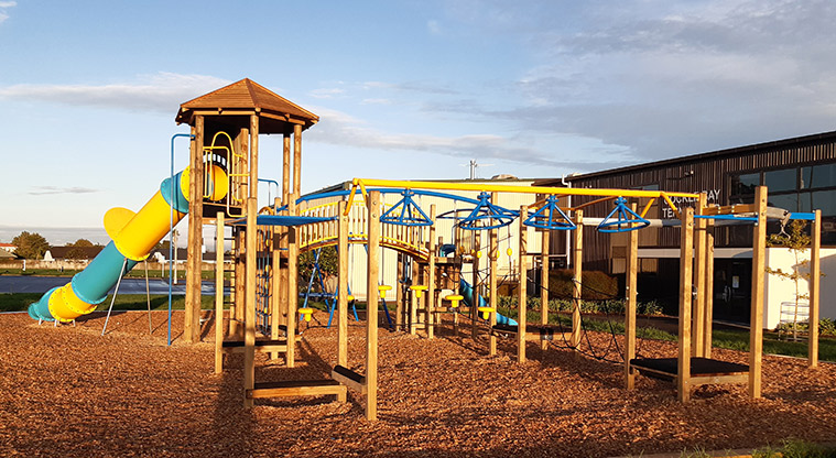 Meadowlland Park - Colourful playground with a variety of climbing, swinging and balancing equipment, a climbing tower and slide.