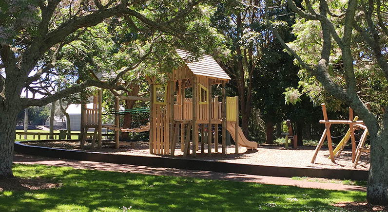 Melville Park – The playground nestled under well-established trees at the St Andrews Road entrance.