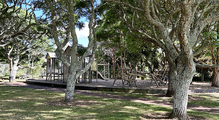 Melville Park - Wooden playground under the trees with climbing nets and towers, platforms, wobbly bridge, and more. Photo credit: S Hulse.