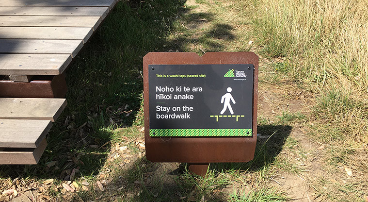 Maungawhau / Mt Eden - Sign at the bottom of the steps asking visitors to stay on the boardwalk.