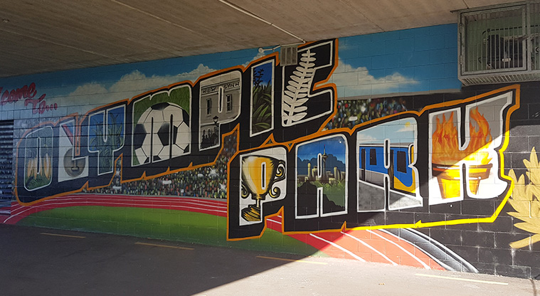 Olympic Park - Large mural on the side of the building.