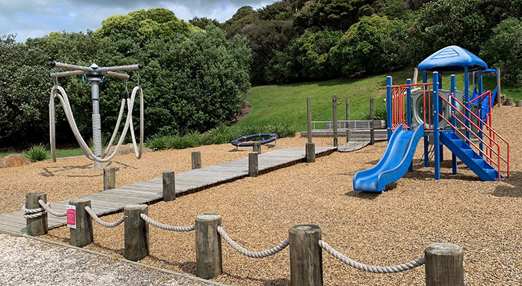 Omana Esplanade - The playground and rope merry-go-round with a boardwalk down the middle.