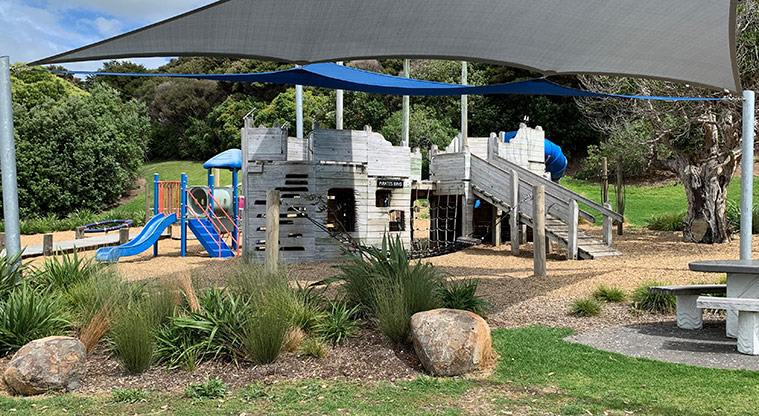 Omana Esplanade - The playground covered with black and blue shade sails.
