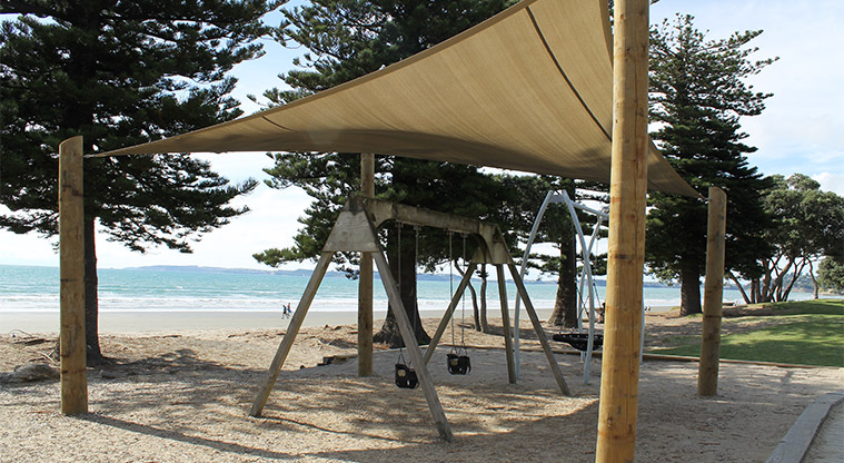Ōrewa Domain - Northern playground has a set of two swings for babies covered with a shade sail. Photo credit: M Loubser.