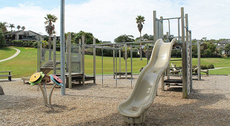 Red Beach Park - A section of the playground with climbing and spinning equipment, and a slide. Photo credit: M Loubser.