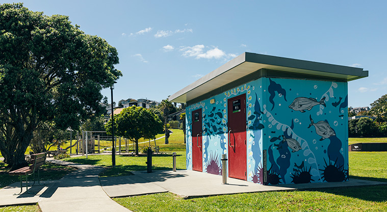Red Beach Park - Toilet block with the playground in the background. Photo credit: J Farnworth.