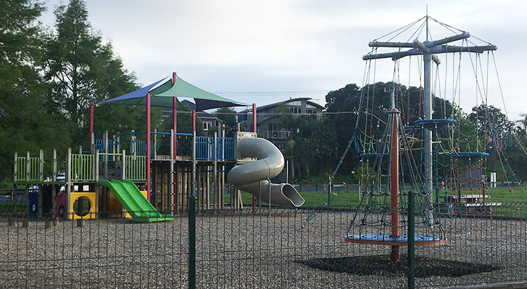 Roberta Reserve - Large colourful playground with climbing equipment, slides, nets, and more.