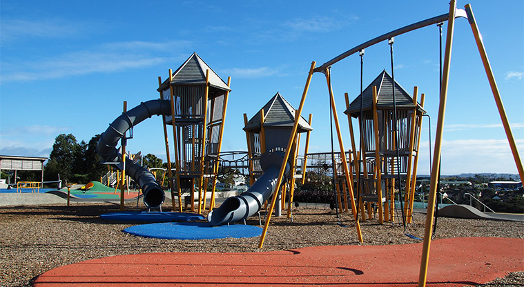 Royal Reserve - Large playground with three tall climbing structures and slides, swings and climbing nets. Photo credit: Tracey Hodder.