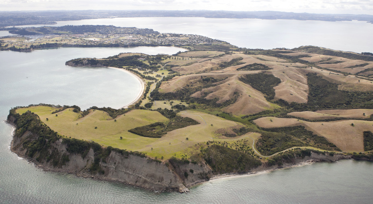 Shakespear Regional Park - Aerial view of the entire park looking towards the North Shore (Pink Beach at the bottom right).