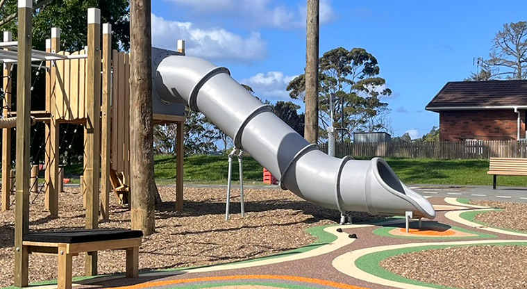 Shepherds Park - Grey covered slide from the top of the wooden play structure.