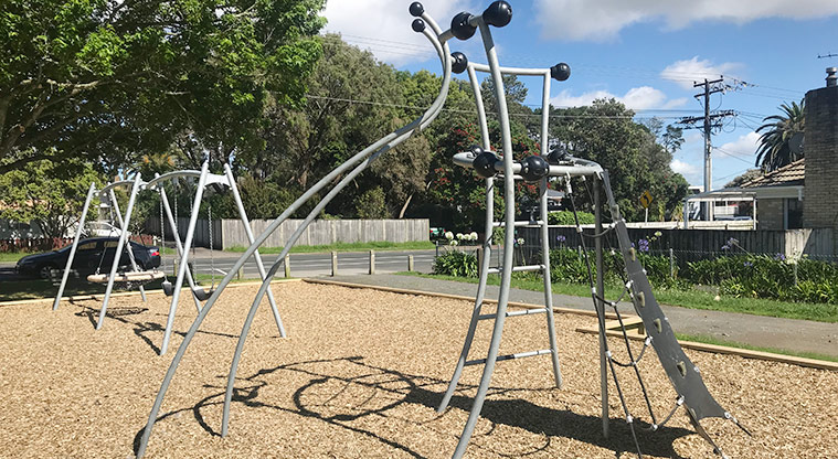 Sister Rene Shadbolt Park - Set of three swings, including an accessible basket swing.