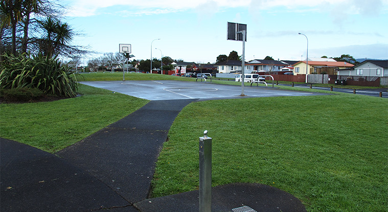 Starling Park - Drinking fountain and a path leading to the basketball court. Photo credit: Tracey Hodder.