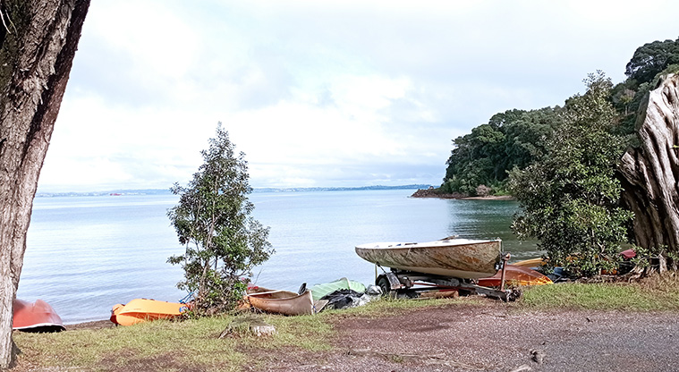 Surfdale Beach - Dinghies and a small boat on a trailer with the bay in the background. Photo credit: K Sumner.