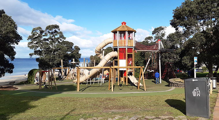 Takapuna Beach Reserve - Playground with multi-level tower, climbing nets, swings, hamster wheel and more.