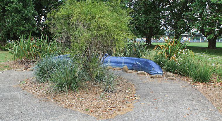 Victoria Park - Large concrete eel tucked in amongst the plants. Photo credit: M Loubser.
