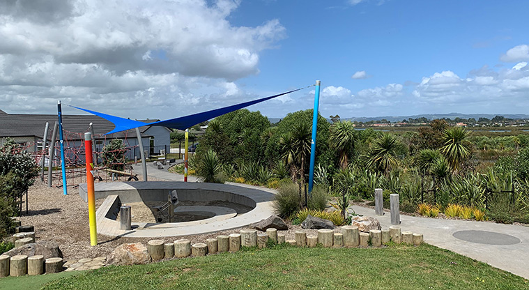 Waimāhia-ki-uta / Waimahia Park - Section of the playground for sand play with blue shade cloth.