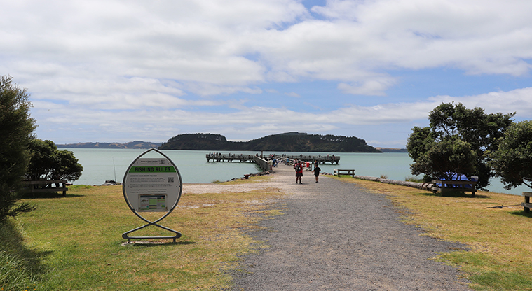 Waitawa Regional Park - Fishing from the wharf at Koherurahi Point.
