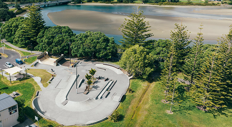 Western Reserve - Aerial view of the whole skate park with trees and the Ōrewa estuary in the background.