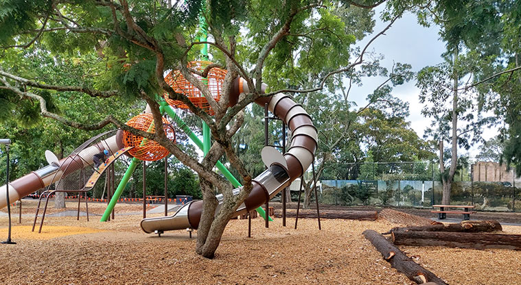 Western Springs Lakeside - High slides set amongst the trees.