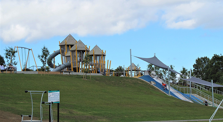 Royal Reserve Path - Playground with huge slide running down the bank.