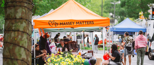 Orange tent at a market event